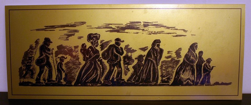 A brass relief depicting the freedom train