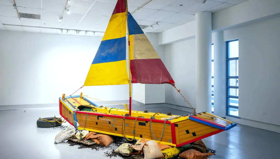 Delicate and Filled with Dynamite. Boat made from basketball court flooring and abandoned playground remnants 15ft long x 13ft tall 2023